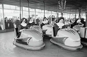 Habit Prints: Nuns Driving Amusement Park Bumper Cars