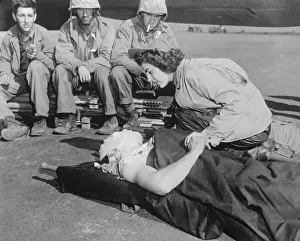 Comforting Prints: Nurse Caring for Wounded Marine at Iwo Jima