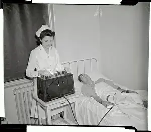 Nurse Getting X-Ray of Patient's Heart
