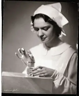 Pill Prints: Nurse Holding Pill And Water Glass