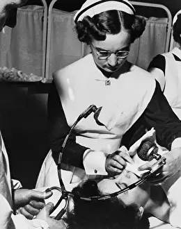 Mental Illness Prints: Nurse Preparing Patient for Shock Therapy