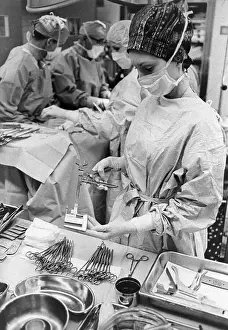 Surgical Scrubs Prints: A Nurse Preparing Sutures