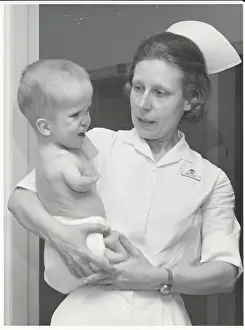 Comforting Prints: Nurse Ruby Tate Holding David
