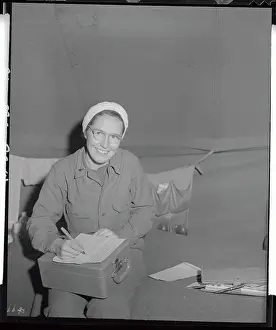 Nurse Stationed At Evacuation Hospital Writing A Letter