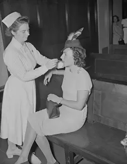 Red Cross Prints: Nurse Taking Woman's Temperature at Blood Drive