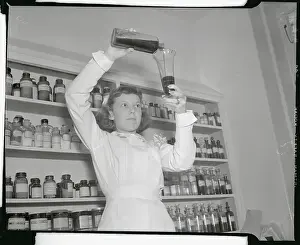 Fort George G Prints: Nurse Working in Pharmaceutical Laboratory
