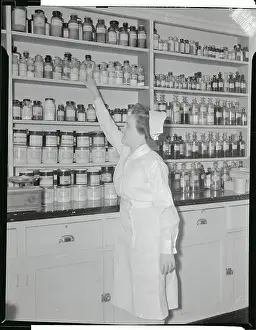 Fort George G Prints: Nurse Working in Pharmaceutical Laboratory