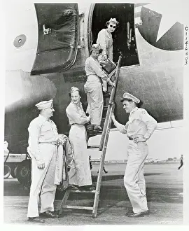 Nurses Boarding Military Airplane
