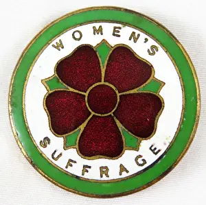 Prints of Red, green, and white enamel pin or badge, with a stylized five-petalled red rose and the text Women's Suffrage, issued by the National Union of Women Suffrage Societies (NUWSS) Historic Moments from the Women’s Fight for the Vote: NUWSS Rose Suffrage Pin