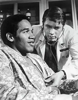 O. J. Simpson and Chad Everett in Television Scene