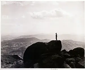 Pinnacle Prints: Observer Stands on Peak of Mountain
