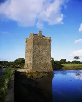 ockfleet Castle Reflected In Water