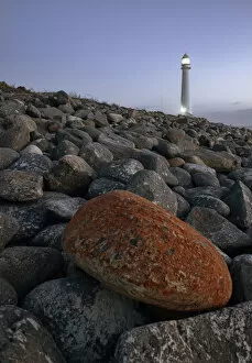 Images Dated 3rd February 2009: The Odd One Out, a single rock stands out of the landscape at the Kommetjie Lighthouse in Cape Town