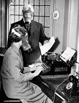 Office workers wearing gas masks (B&W)