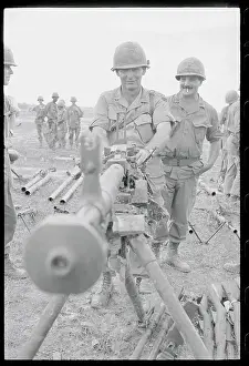 Major General Prints: Officer Inspecting Captured Vietcong Machine Gun