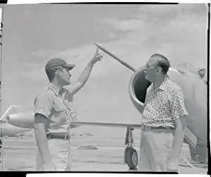 Paul G Prints: Officer Pointing to a Needle on a Jet Plane