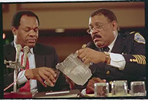 Officer Pouring Water for Marion Barry