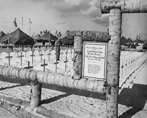Officer Stands At Marine Grave