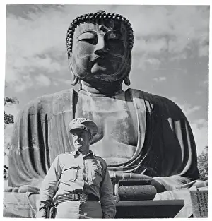 Robert L Prints: US Officer Stands Near Giant Buddha