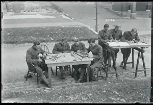 Officers Making Miniature Warships and Maps
