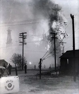Derrick Prints: Oil Derrick Shown on Fire
