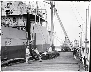 Hose Prints: Oil Tanker Being Loaded from Large Hoses