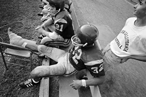 O.J. Simpson on Bench with Foot Wrapped up