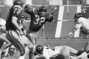 O.J. Simpson Eludes Tacklers