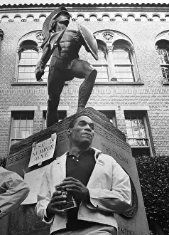 O.J. Simpson Stands Before Tommy Trojan Statue