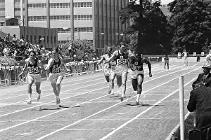 O.J. Simpson Takes Baton During Relay Race