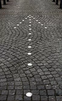 Old directional arrow sign on cobblestone street, Hamburg, Germany, Europe