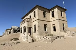 Images Dated 26th February 2015: Old houses in the former diamond town, now a ghost town, Kolmanskop, Kolmannskuppe