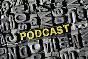 Gray Collection: Old lead letters forming the word Podcast