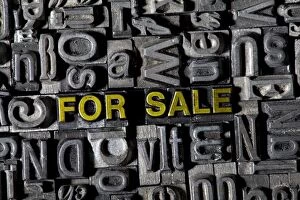 Old lead letters forming the words FOR SALE