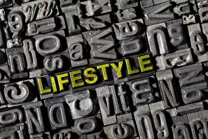 Old lead letters spelling the word LIFESTYLE