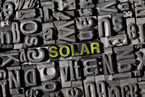 Old lead letters spelling the word SOLAR