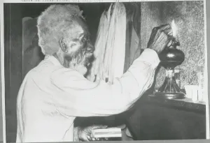 Mississippi Prints: Old Man Lighting Oil Lamp