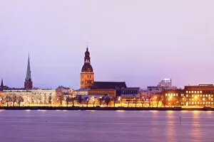 Business Finance And Industry Collection: Old Riga skyline at dusk and Daugava river. Riga, Latvia
