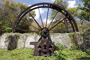 Decayed Prints: Old sugar cane mill, mill wheel, rusted, Trinidad and Tobago