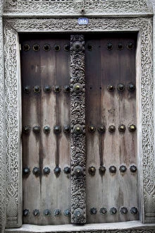 Images Dated 28th September 2014: Old traditional wooden door in Stone Town