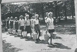 Endurance Prints: Older German Youngsters Carrying Pails