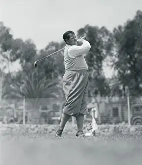 Prints of (Original Caption). Catalina Island, California: A Clouting Comedian Timeless Comedy Icons: Classic Moments from the Legendary Duo: Oliver Hardy in Golfing Action