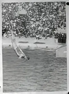 Olympian Diving into Swimming Pool