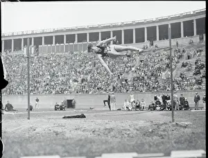 Olympic Champion Leaping Over Bar