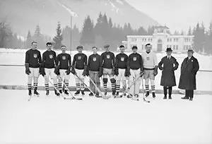 Prints of (Original Caption) 1/30/1924-Chamonix, France: U.S. Olympic hockey team poses before practice. L to r: Lyons, McCarthy, Synnott, Drury, Langley, Small, Rice, La Croix, Abel, Haddock and Murray Frozen Moments: A Journey Through Hockey History: Us Olympic Hockey Team Posing