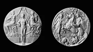 Prints of (Original Caption). London England. Olympic Games first place medal Capturing Glory: A Journey Through Olympic History: Olympic Medal