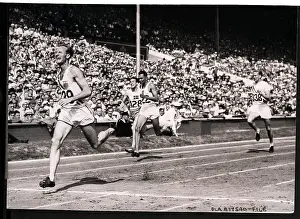 Hurdle Prints: Olympic Runners Finishing Hurdles Race