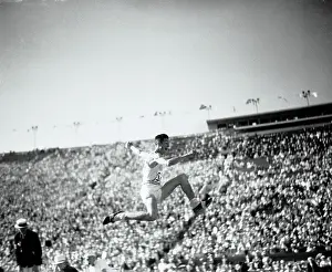 Long Jump Prints: Olympic Silver Medalist Charles Lambert Redd in Broad Jumper