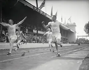 Prints of Antwerp: The Olympic Games At Antwerp. Paddock winning the 100 Meter finals. Photo shows Paddock at left, Ali Khan of France (295), Murchison (202), and Kirksey (188) Capturing Glory: A Journey Through Olympic History: Olympic Track Stars in Action