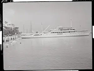Onasis Yacht Docked Near Shore